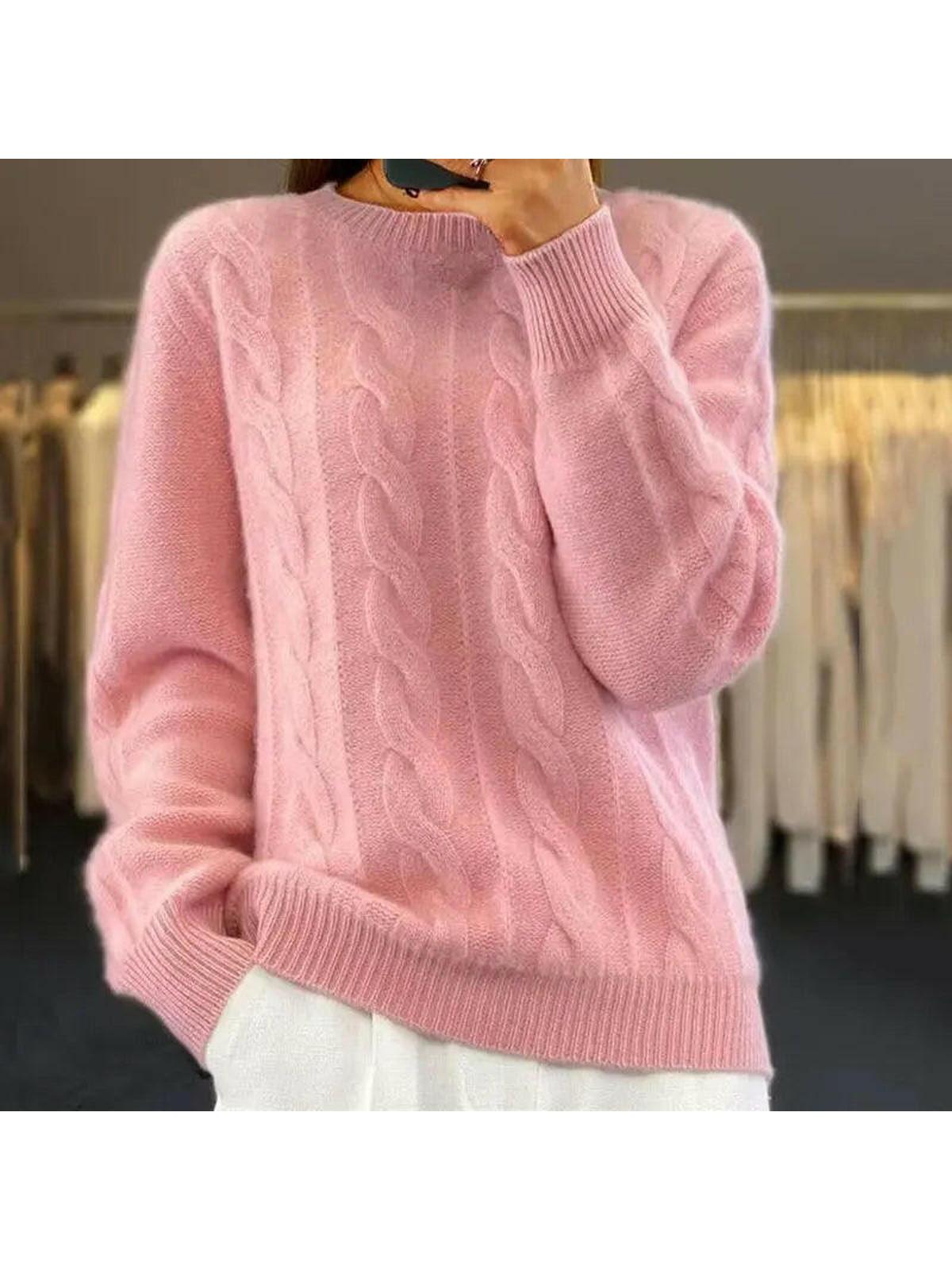 Beige Lumina Vancouver Camila elegant knit sweater, styled with a relaxed fit and subtle ribbed detailing, perfect for casual wear.