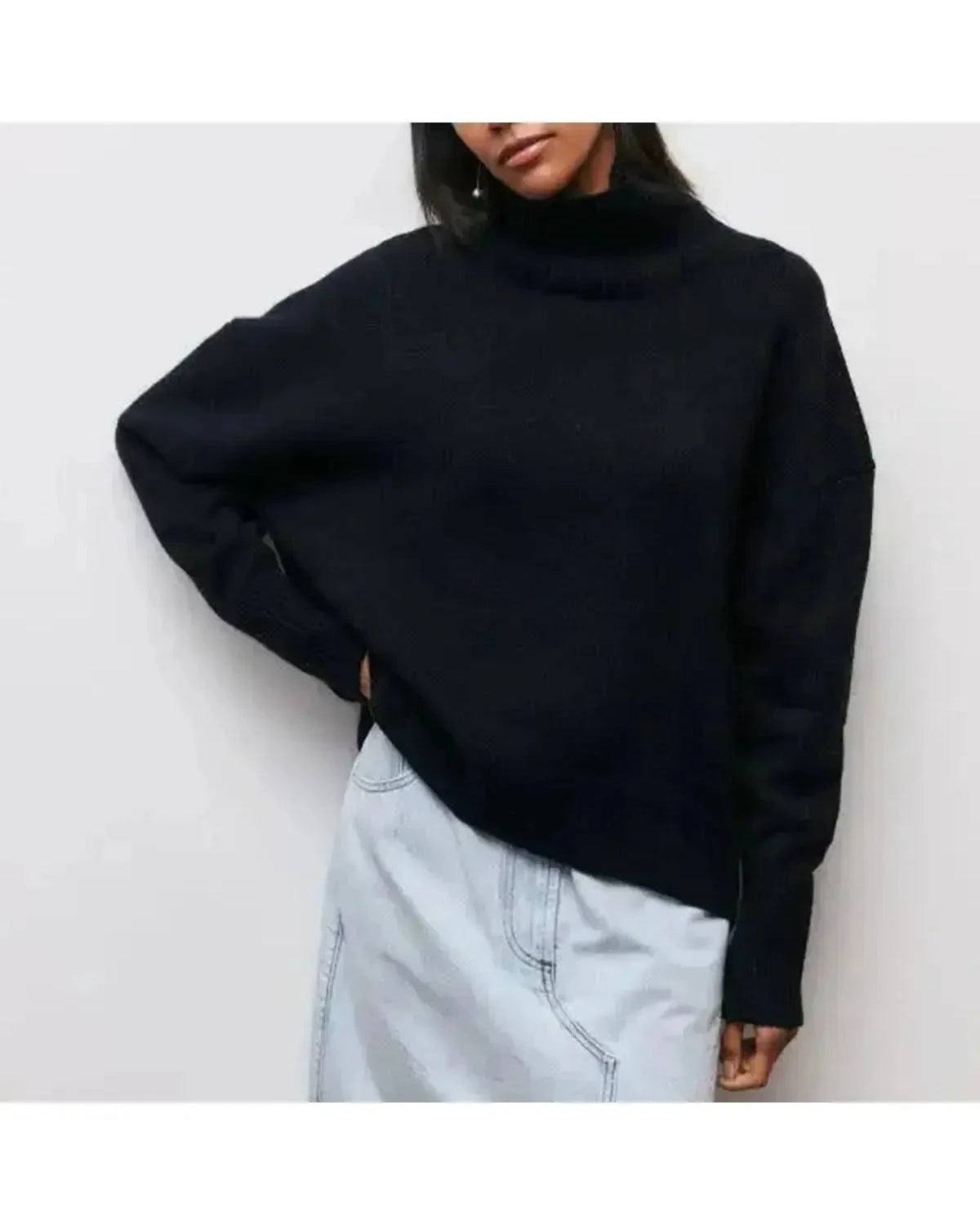 Blue Lumina Wear Mia cozy turtleneck sweater with ribbed cuffs and neckline, styled casually on a mannequin.