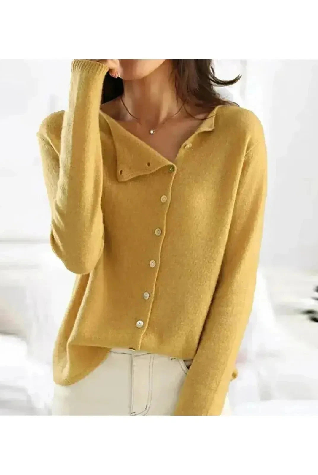 Gray Lumina Wear Malu knitted sweater, cozy and stylish, shown on a model with a soft, textured knit fabric.