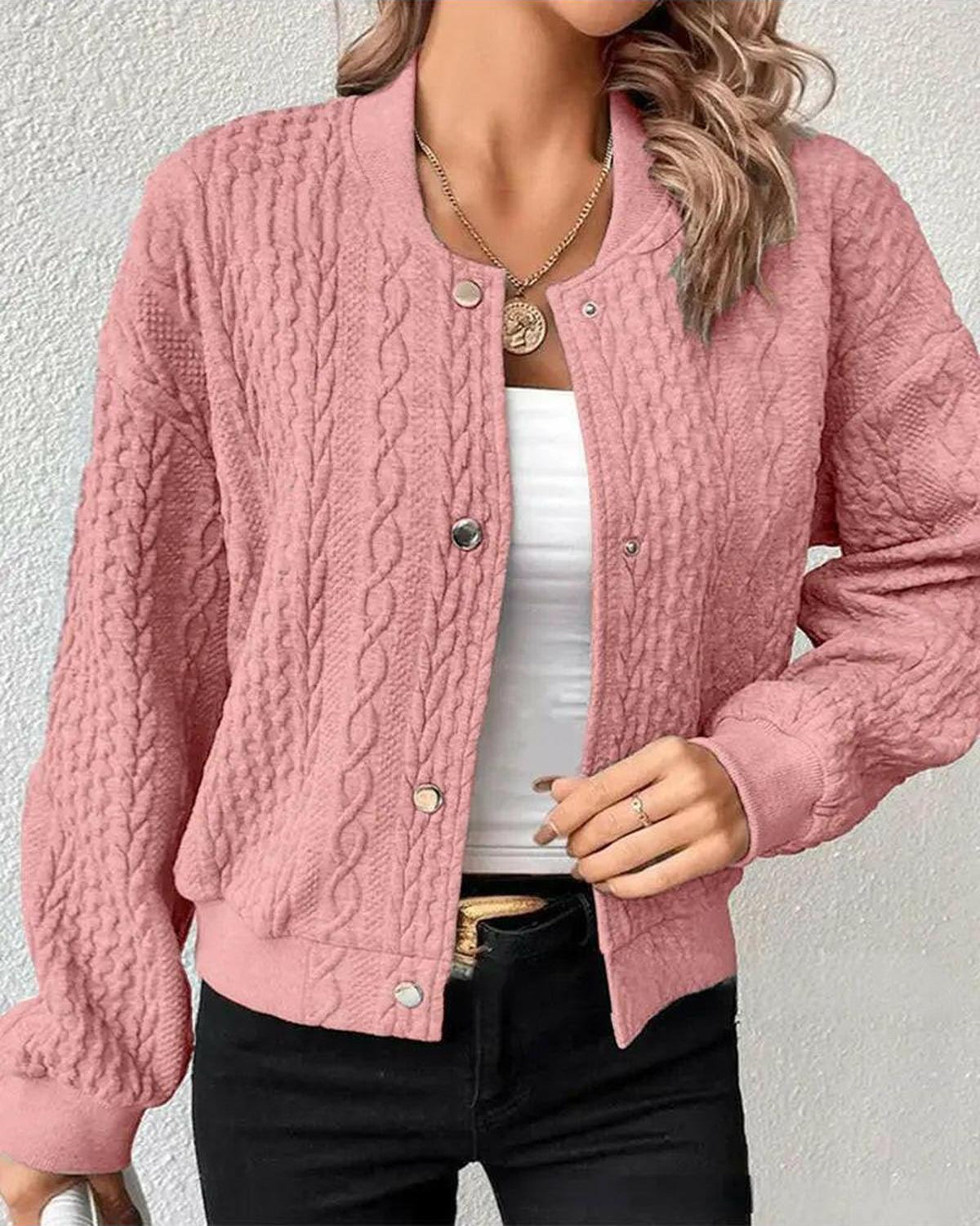 Grey Amaia cardigan by Lumina Wear, shown on a model, featuring a cozy knit design and a relaxed fit.