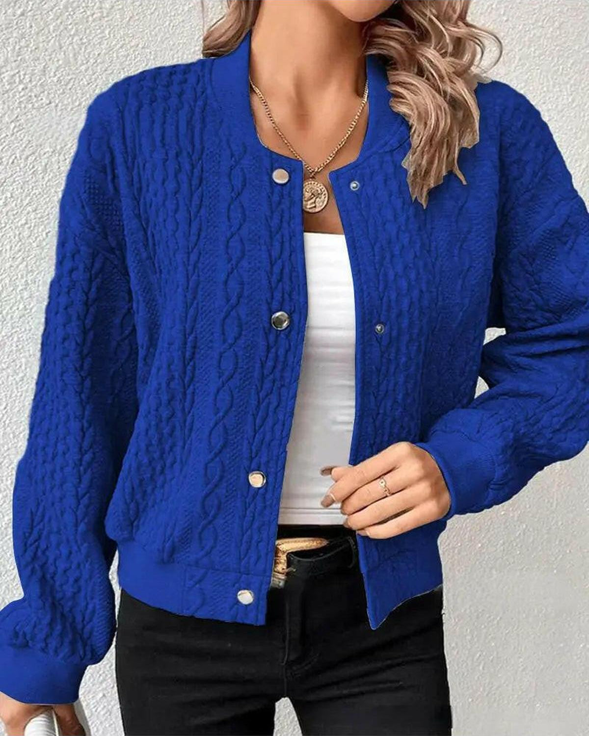 Grey Amaia cardigan by Lumina Wear, shown on a model, with a relaxed fit and button-front design.