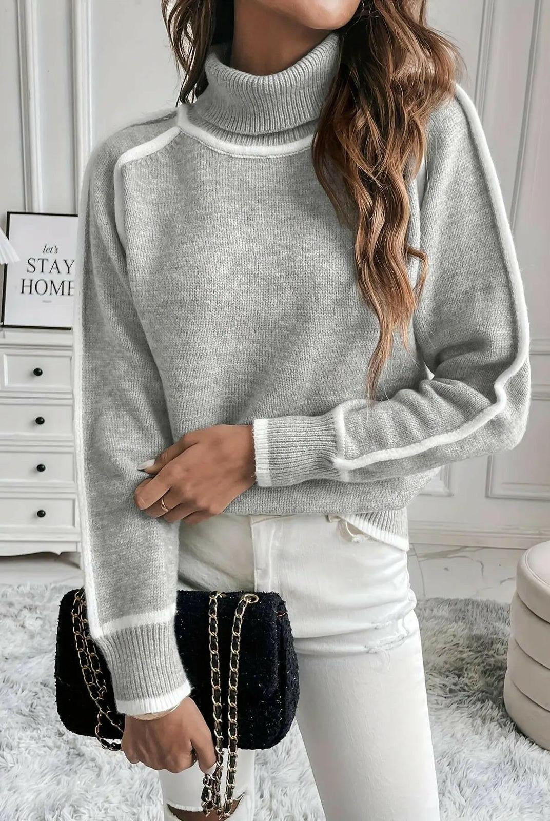 Lumina Wear Maura turtleneck sweater, cozy knit sweater in neutral color, close-up of fabric texture and high neckline.