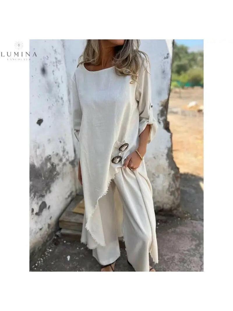 Lumina Vancouver Femmes blue two-piece set featuring a stylish top and matching pants, perfect for sophisticated casual wear.