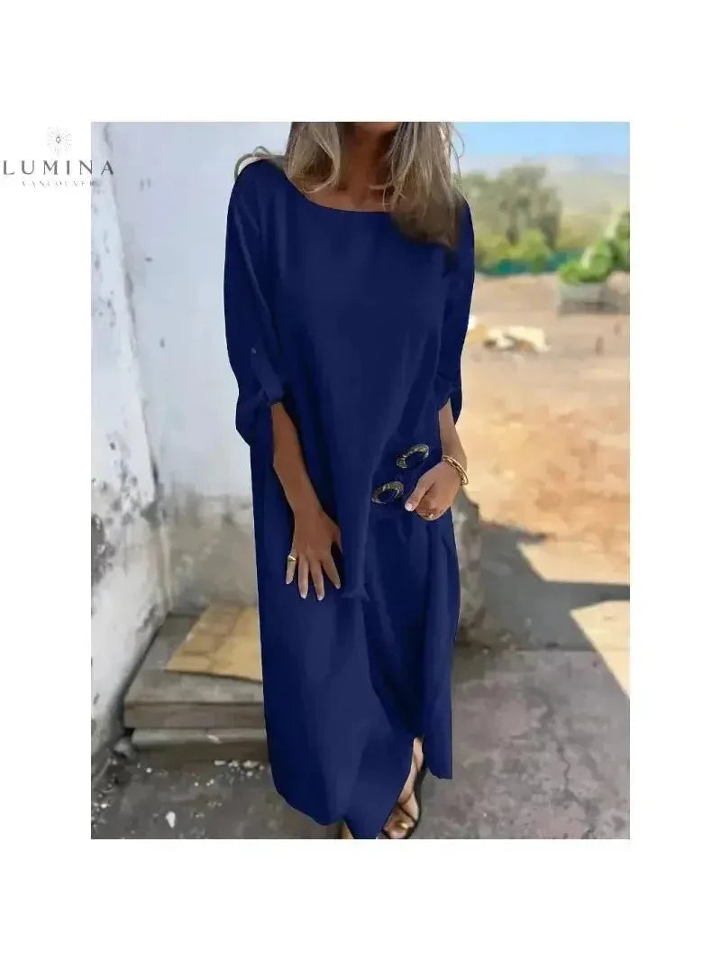 Lumina Vancouver Femmes blue two-piece set with elegant, tailored top and matching skirt, perfect for sophisticated stylish looks.