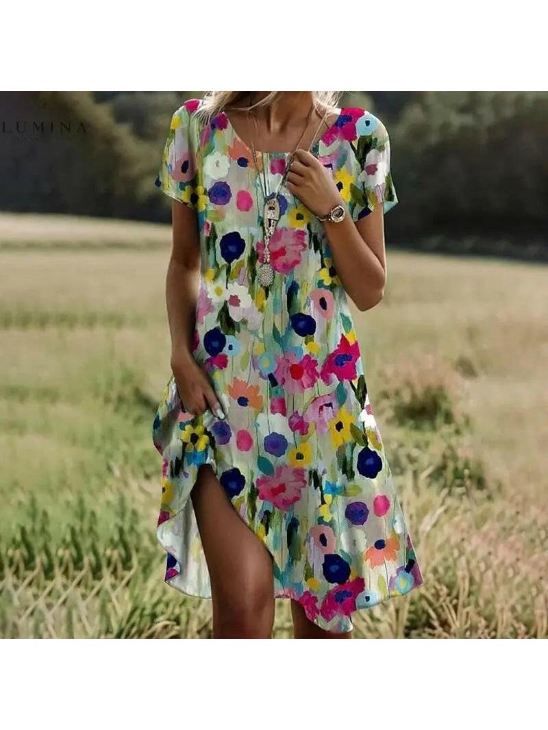 Lumina Vancouver Callie Spring Dress featuring a colorful floral pattern and lightweight fabric, perfect for warm weather.