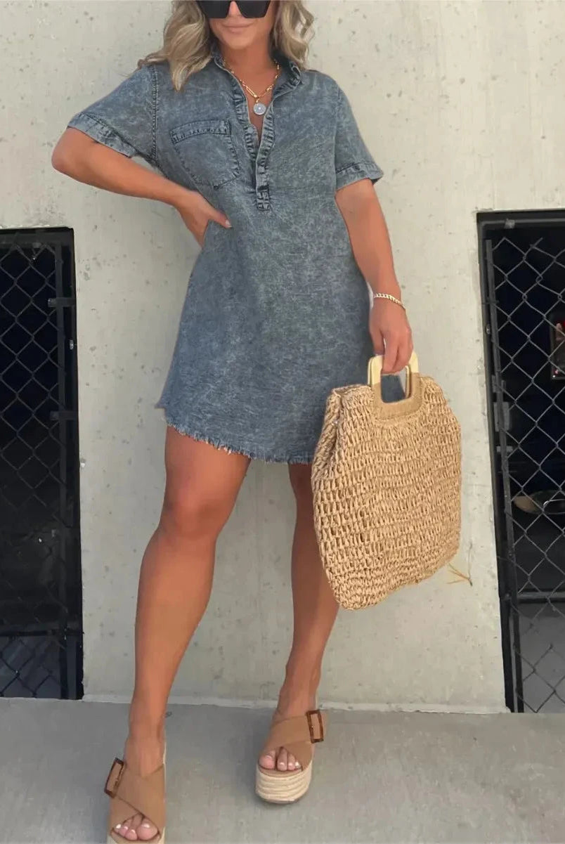 Grey Emberlynette denim shirt dress by Lumina Vancouver, showcasing a casual, button-front design with collar and rolled sleeves.