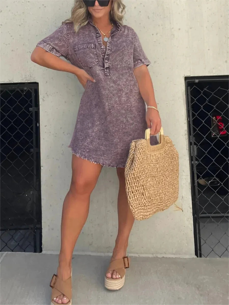 Gray denim shirt dress by Lumina Vancouver featuring a casual fit and button-up front, styled for a relaxed, contemporary look.