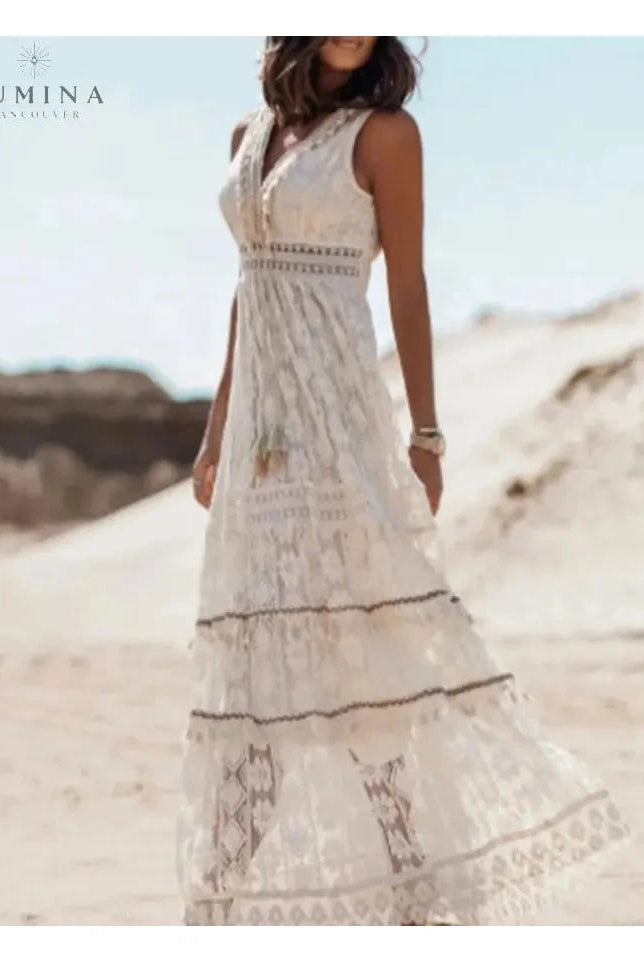 Lumina Wear Manon elegant boho dress in beige, flowing fabric with relaxed fit and stylish design, perfect for holiday vibes.