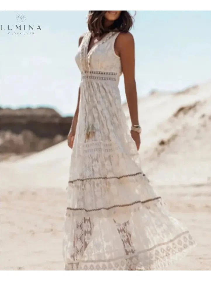 Light beige Manon elegant boho dress by Lumina Vancouver, perfect for holiday vibes, featuring flowing fabric and stylish design.