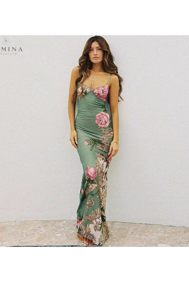 Green Gaia flower dress by Lumina Wear, lightweight floral dress with vibrant pattern, perfect for casual and holiday wear.