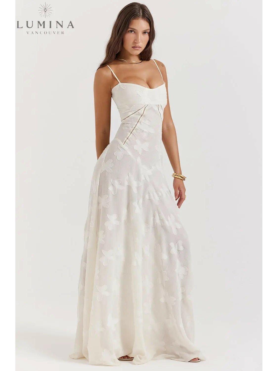 Lumina Vancouver Mireille Romantic Summer Dress in white, perfect for holiday vibes, featuring lightweight fabric and elegant design.