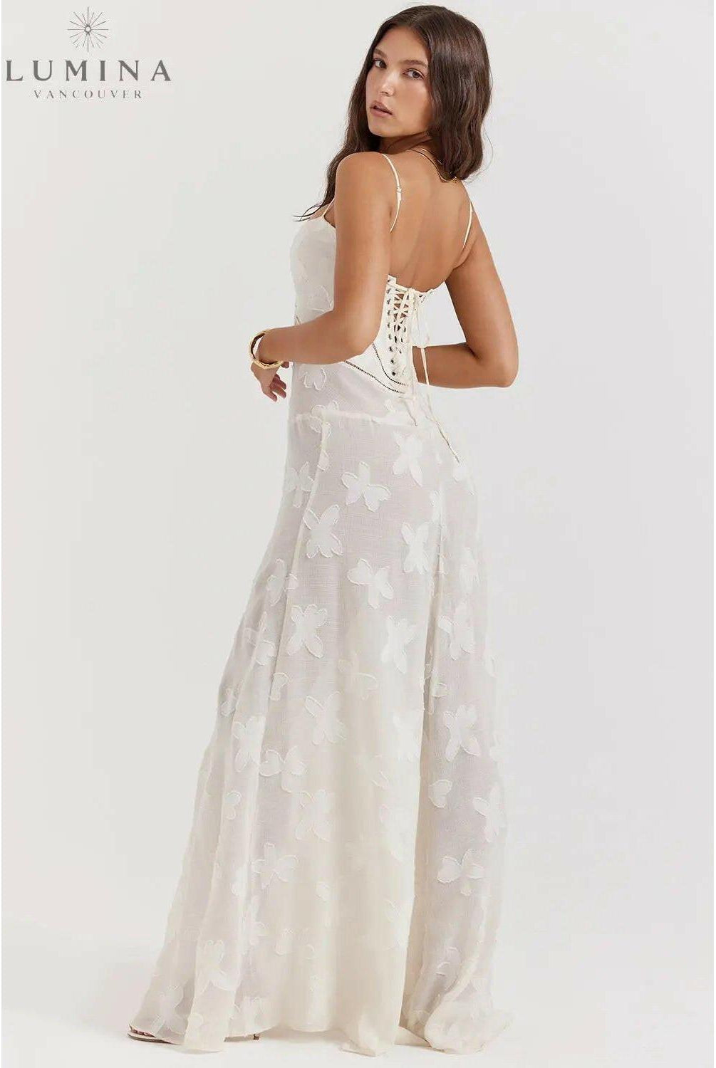 White Mireille Romantic Summer Dress by Lumina Wear, featuring lightweight fabric and flowy design for warm-weather style.
