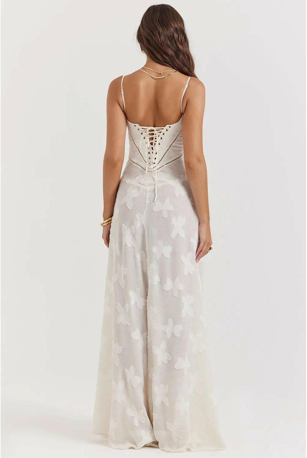White Mireille romantic summer dress by Lumina Wear, featuring lightweight fabric and flowy design perfect for warm weather.