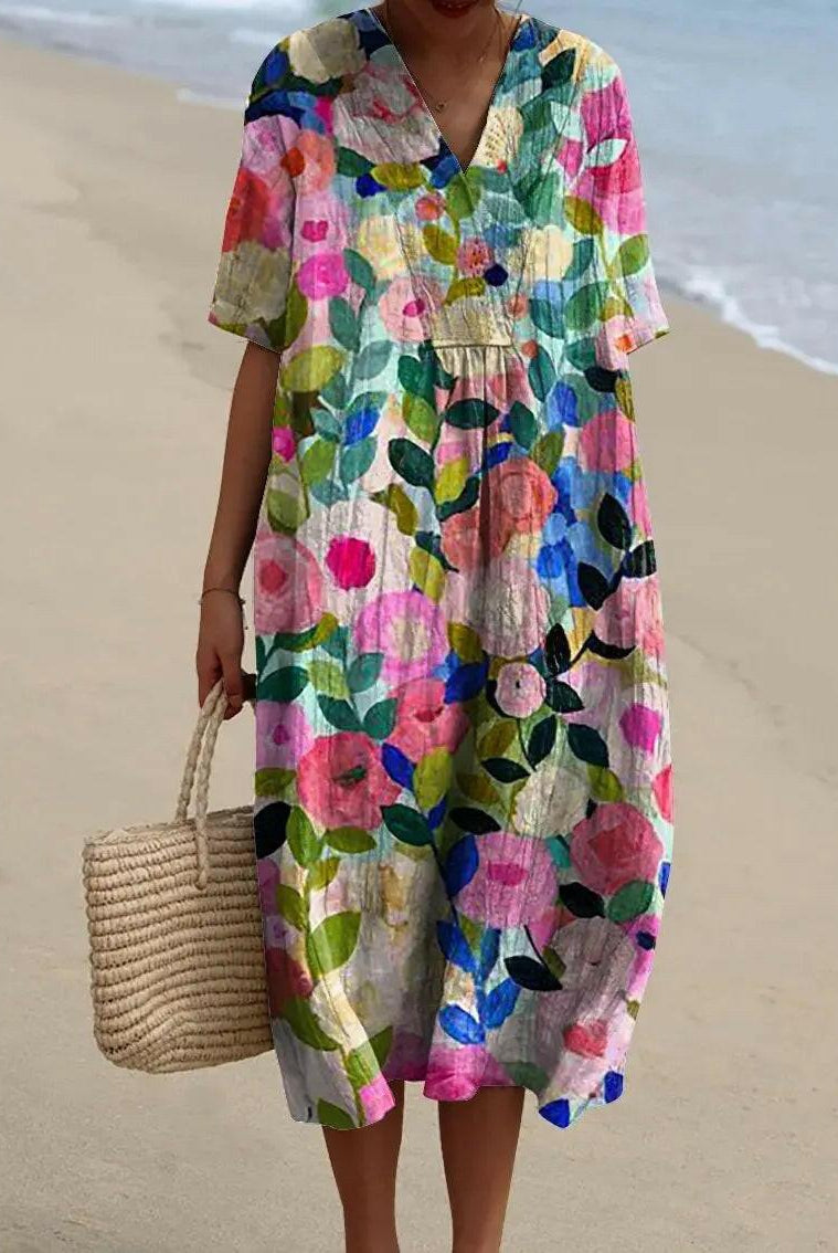 Multi-color flower dress by Lumina Wear featuring a vibrant floral pattern and lightweight fabric, perfect for spring or summer.