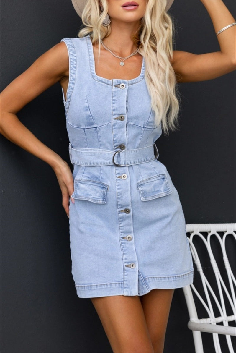 Light blue Lumina Wear Lyra sleeveless button-down denim dress with a fitted silhouette and classic collar.
