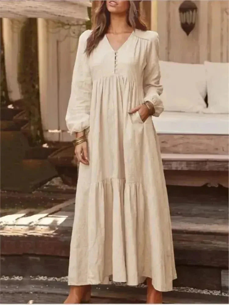 Light yellow Giulia long sleeve dress by Lumina Vancouver displayed on a model, showcasing its elegant, flowing design.