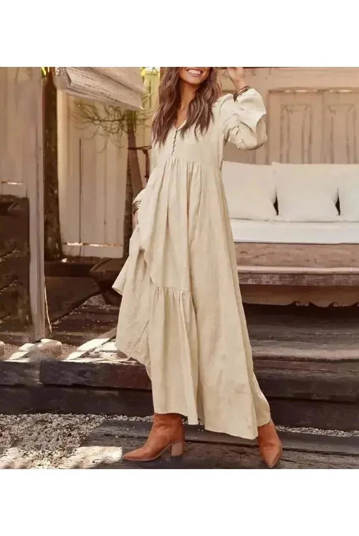 Light yellow Lumina Vancouver Giulia long sleeve dress displayed on a mannequin, showcasing its elegant design and fabric details.