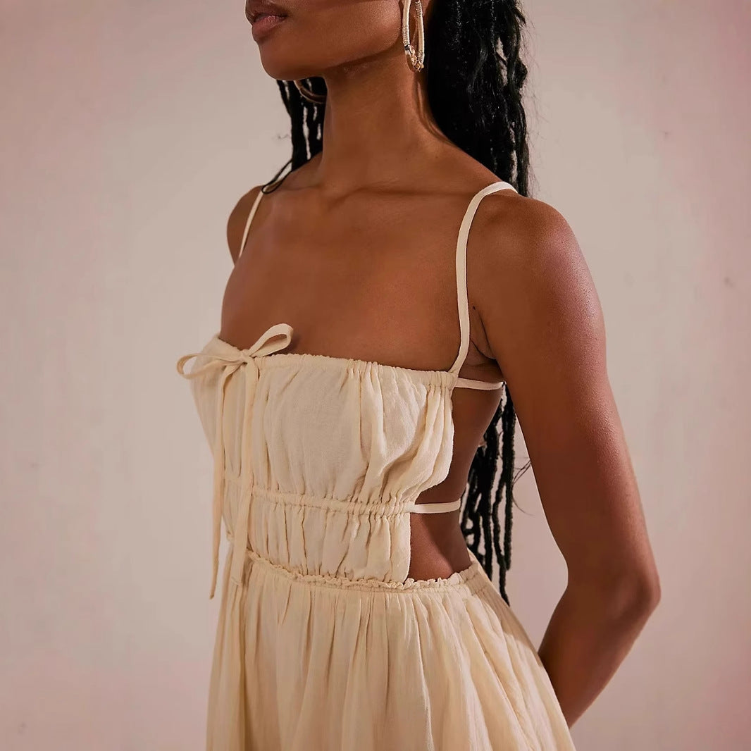 Lumina Vancouver Valence mini dress with smocked bust and strap details in apricot, showcasing a stylish and fitted design.