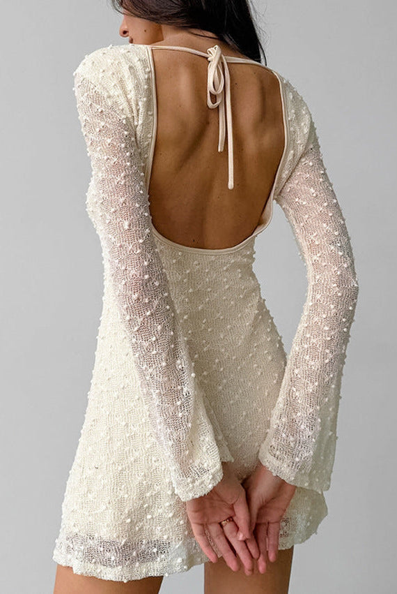 Lumina Vancouver Wynonna mini dress in apricot with textured jacquard fabric, showcasing a stylish and elegant mini dress design.