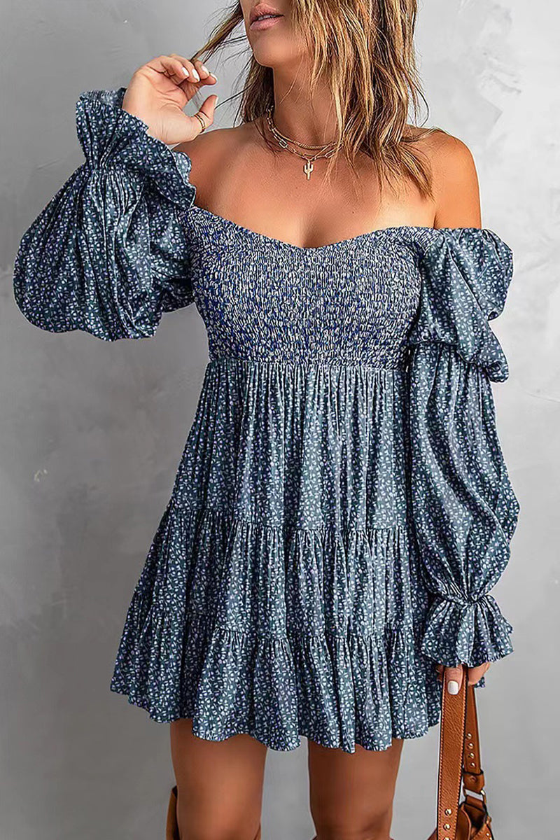 Apricot off-shoulder mini dress by Lumina Vancouver featuring a fitted silhouette and ruffled neckline.