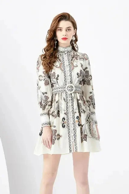 Apricot embroidered mini dress by Lumina Wear, featuring intricate embroidery and a stylish short dress design.