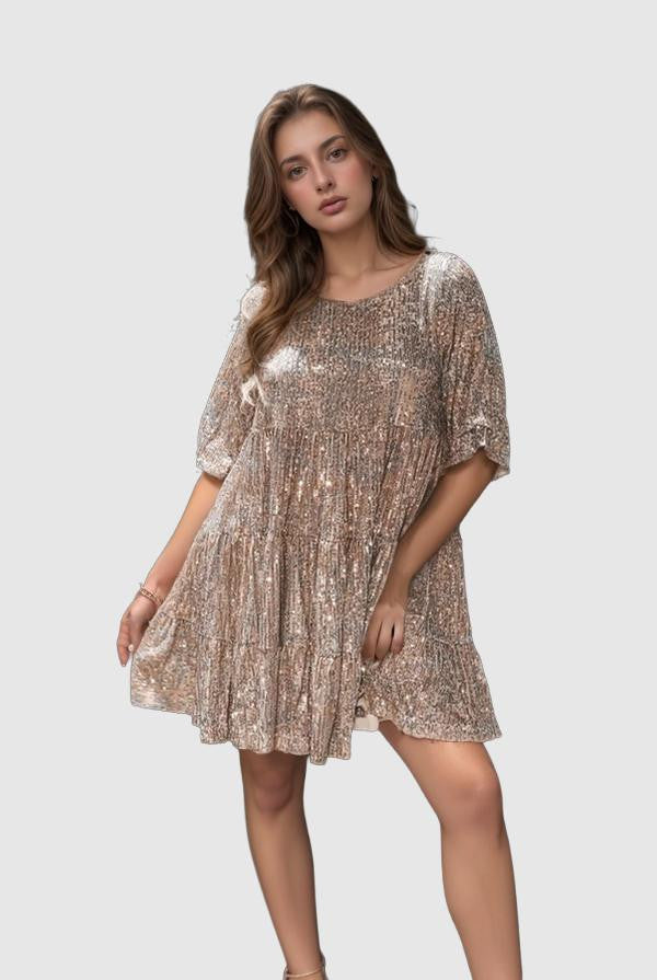 Apricot Lyra loose fit tiered mini dress by Lumina Vancouver featuring flowing fabric and a relaxed, stylish silhouette.