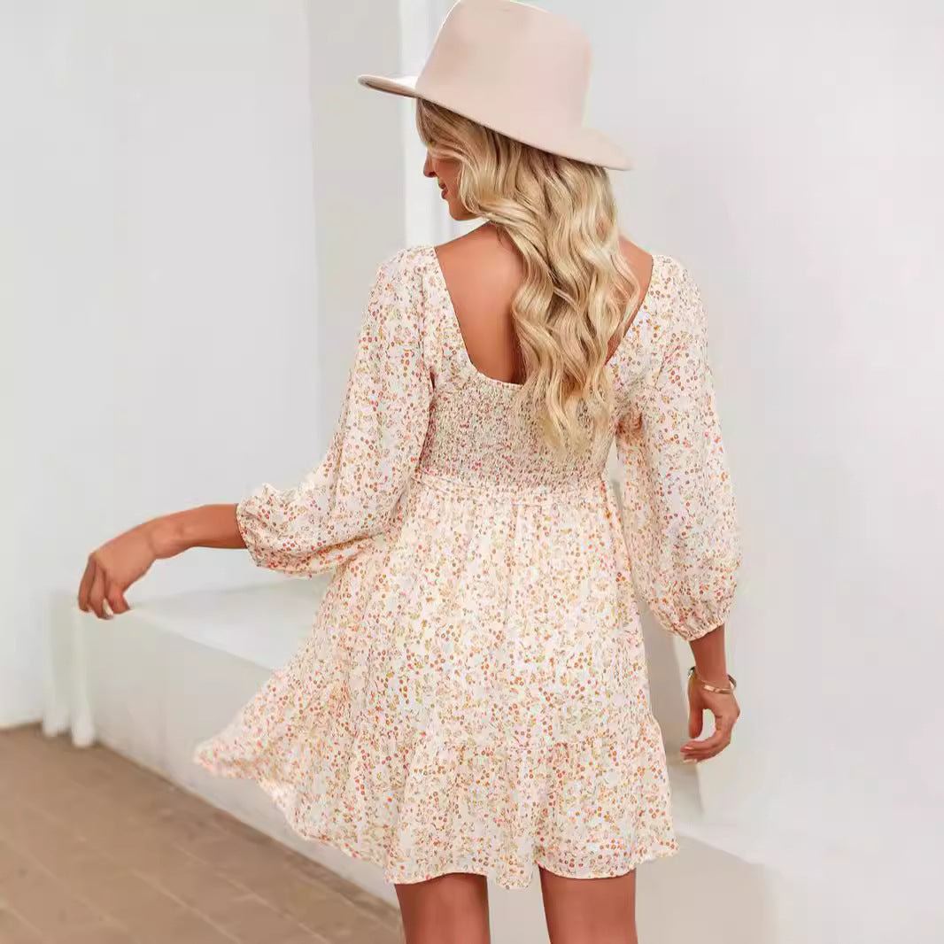 Apricot Valentina Rose Harlow A-Line Mini Dress by Lumina Vancouver, with flowy fabric and feminine silhouette.