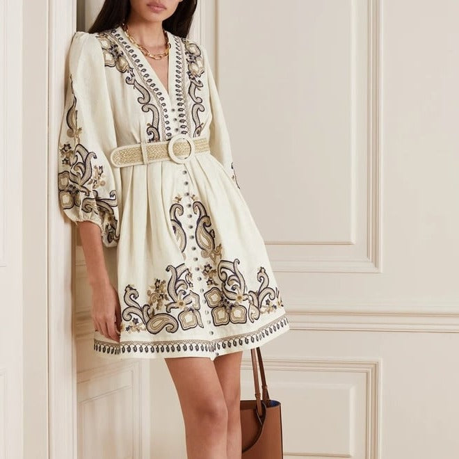 Apricot embroidered boho mini dress by Lumina Vancouver featuring intricate marigold embroidery and a relaxed, stylish fit.