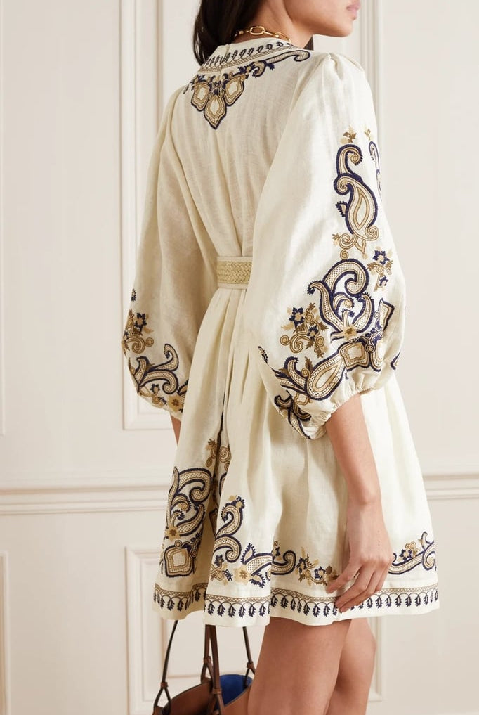 Apricot embroidered boho mini dress by Lumina Vancouver featuring intricate marigold embroidery and relaxed fit.