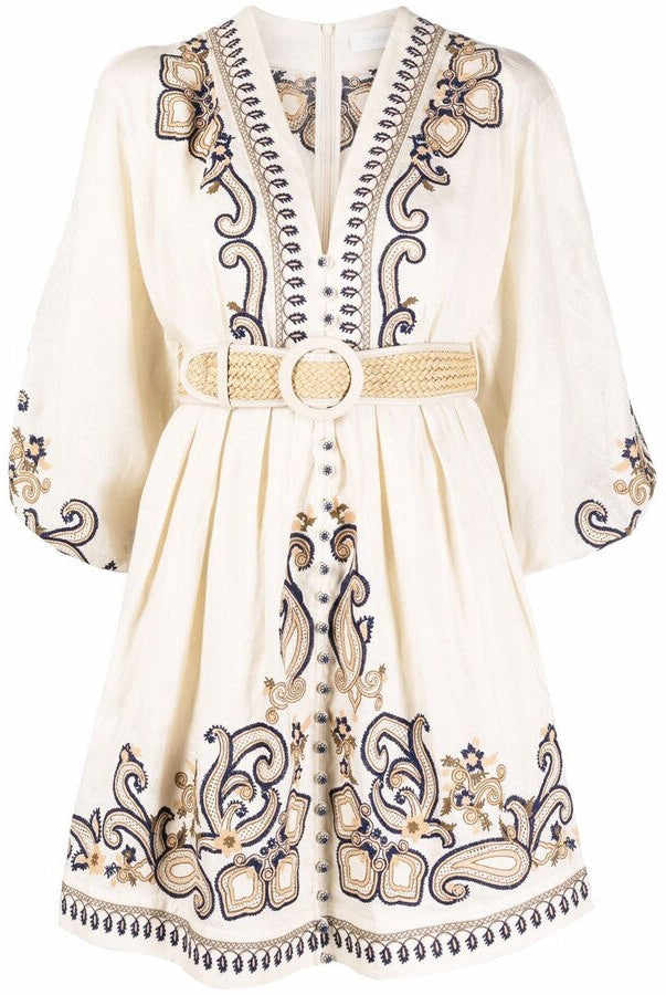Apricot embroidered boho mini dress by Lumina Vancouver featuring marigold floral embroidery and relaxed, flowy design.