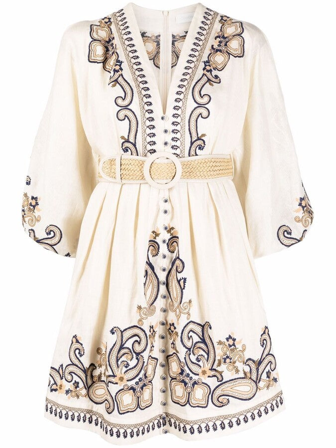 Apricot embroidered boho mini dress by Lumina Vancouver featuring marigold floral embroidery and relaxed, flowy design.