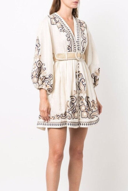 Apricot embroidered boho mini dress by Lumina Vancouver with intricate marigold embroidery, perfect for casual and festival wear.