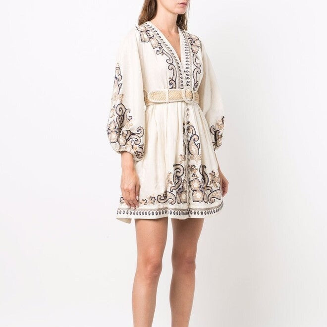 Apricot embroidered boho mini dress by Lumina Vancouver with intricate marigold embroidery, perfect for casual and festival wear.