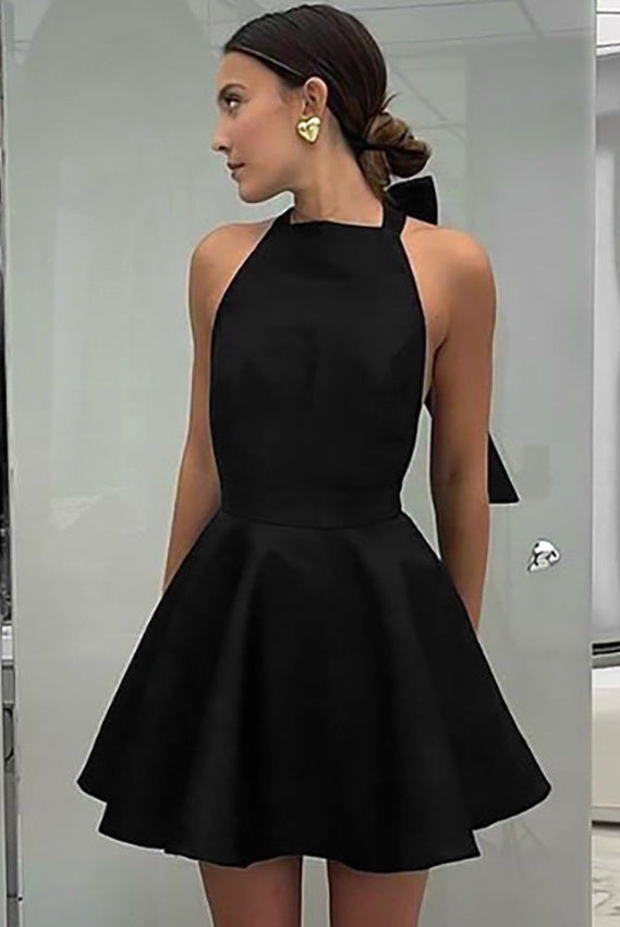 Black Alexandrine halter neck mini dress by Lumina Vancouver, stylish sleeveless dress with a fitted silhouette.