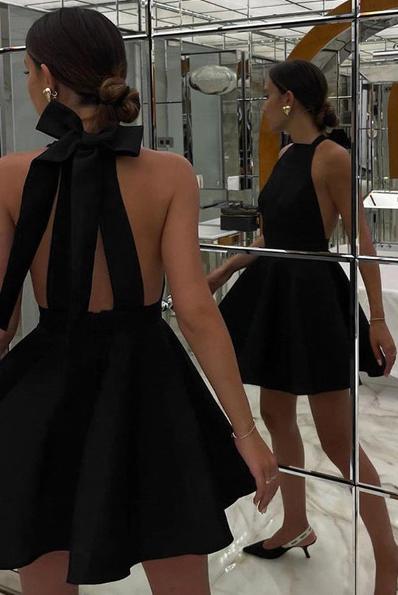 Black Alexandrine halter neck mini dress by Lumina Vancouver, stylish sleeveless dress with a fitted silhouette.