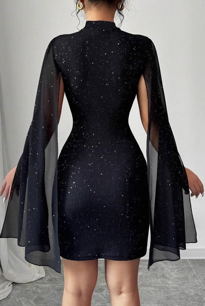 Black Aurora Belle Celeste mini cape dress by Lumina Vancouver, stylish short dress with elegant cape detail.