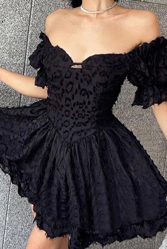Black off-shoulder mini dress by Lumina Wear, featuring a fitted silhouette and stylish design from Lumina Vancouver.