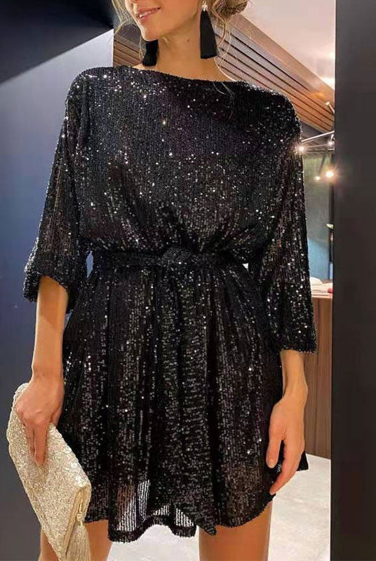 Black Celeste sequin mini dress by Lumina Vancouver, loose fit with shimmering sequins, stylish party dress for women.
