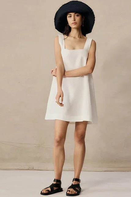 Black Celestina sleeveless mini dress by Lumina Wear, featuring a fitted silhouette and stylish design for casual or evening wear.