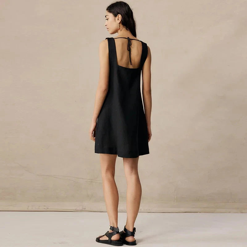 Black Celestina sleeveless mini dress by Lumina Vancouver, featuring a fitted silhouette and stylish design.