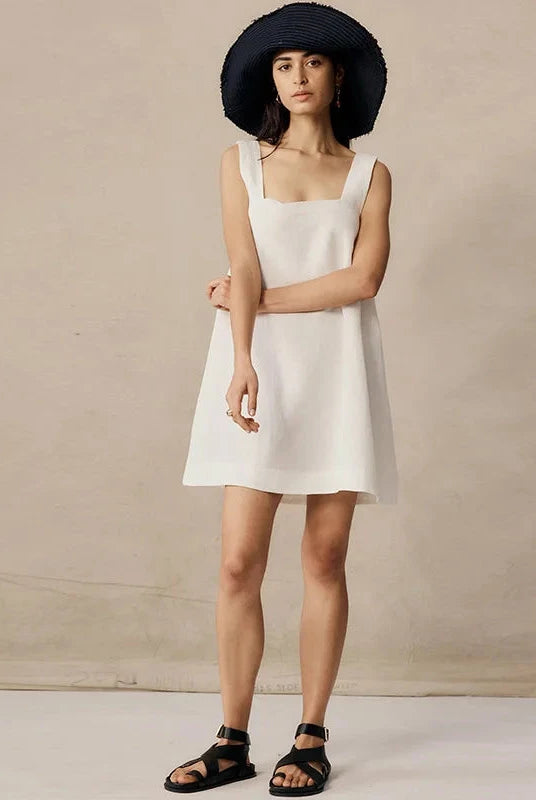 Black Celestina sleeveless mini dress by Lumina Wear, featuring a fitted silhouette and stylish design from Lumina Vancouver.