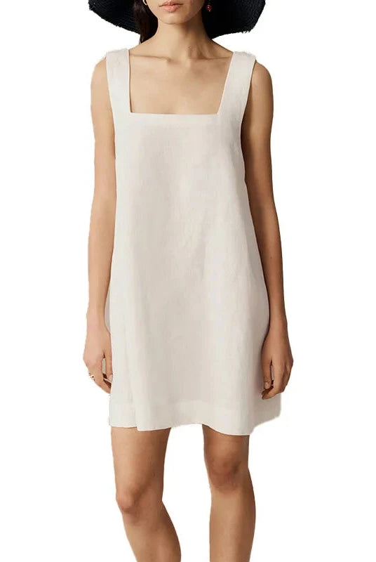 Black Celestina sleeveless mini dress by Lumina Vancouver, fitted silhouette, stylish for casual or evening wear.