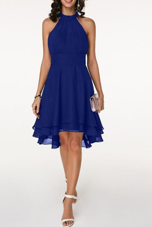 Black Lyra halter neck mini dress with layered skirt by Lumina Vancouver, shown on a model.