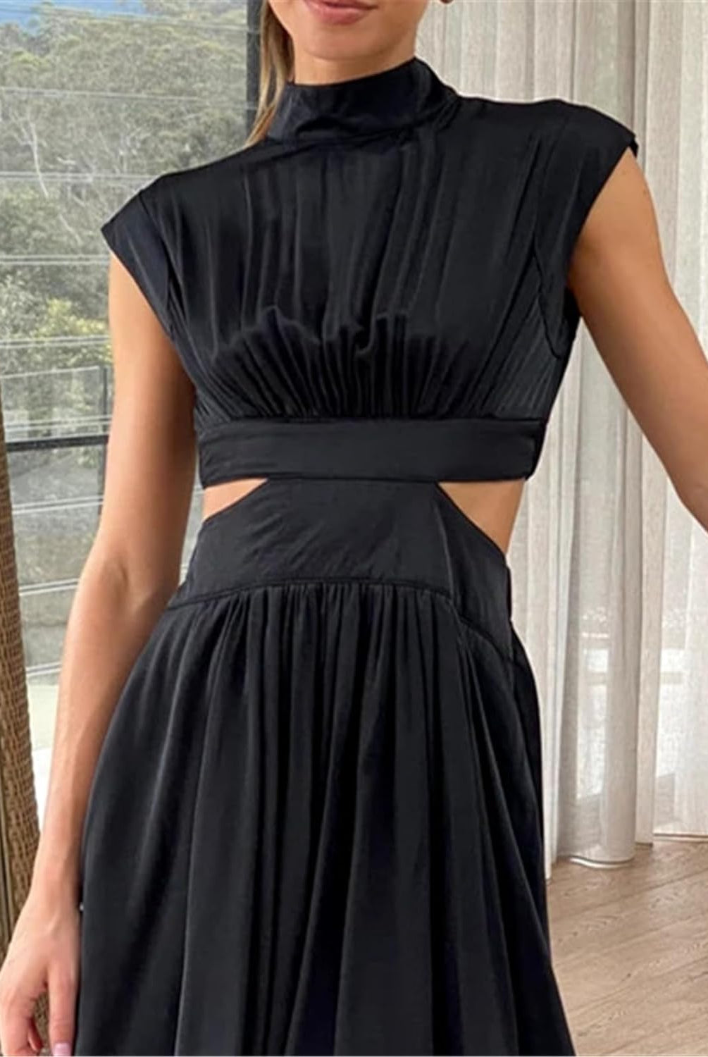 Black Nova two-piece sleeveless mini dress outfit by Lumina Vancouver featuring a stylish, fitted design perfect for casual or evening wear.