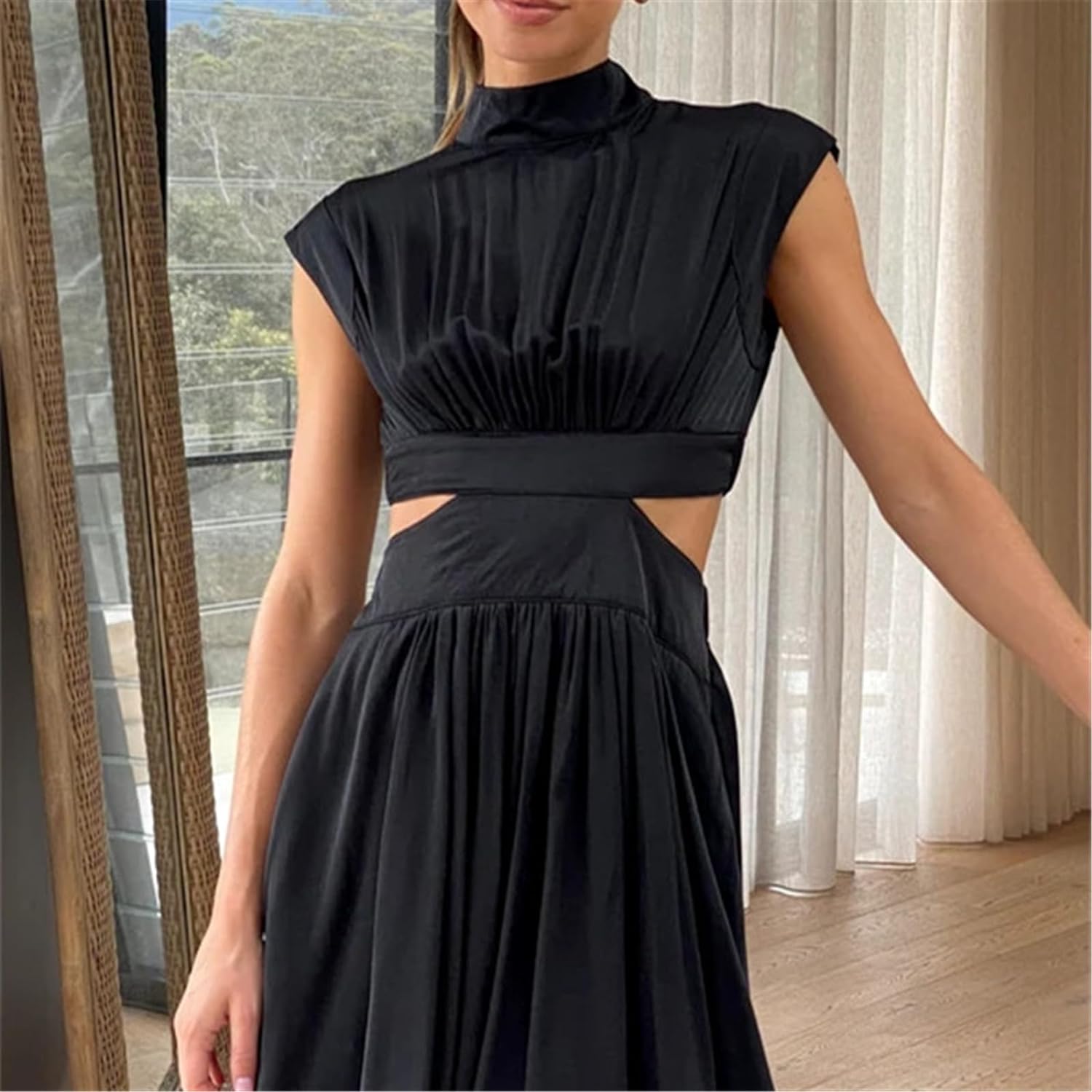 Black Nova two-piece sleeveless mini dress outfit by Lumina Vancouver featuring a stylish, fitted design perfect for casual or evening wear.