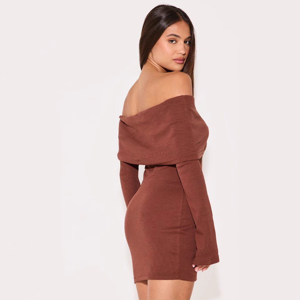 Black Novara off-shoulder mini dress by Lumina Vancouver, stylish short dress with a fitted silhouette and elegant neckline.