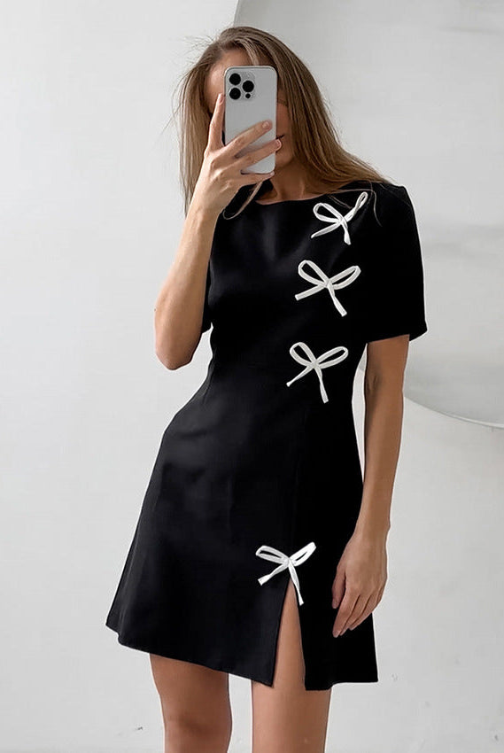 Black Seraphine Marigold A-Line Mini Dress by Lumina Wear, featuring a stylish silhouette and elegant design.