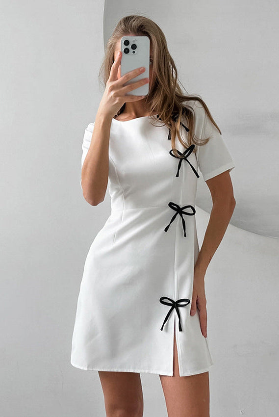 Black Seraphine Marigold A-Line Mini Dress by Lumina Wear, shown on model, featuring a stylish silhouette and elegant design.