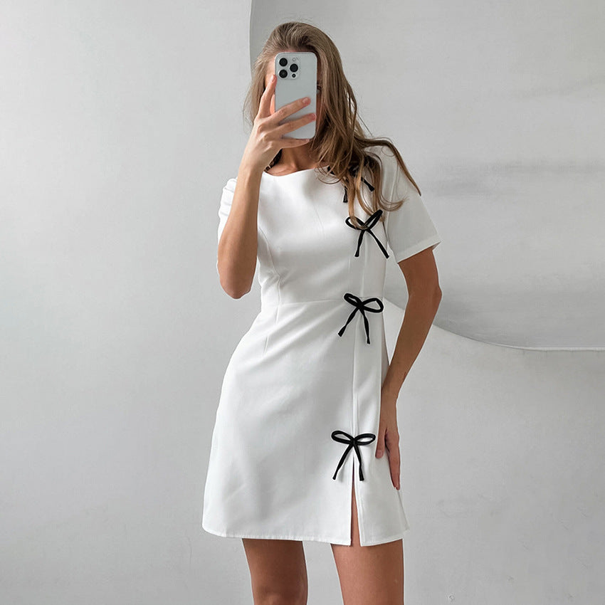 Black Seraphine Marigold A-line mini dress by Lumina Vancouver, featuring a flattering silhouette and stylish design.