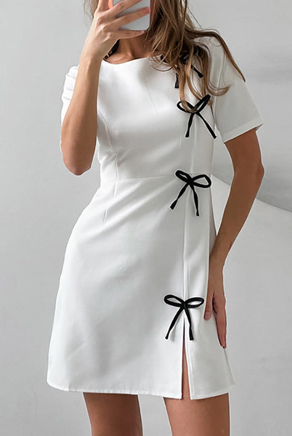 Black Seraphine Marigold A-line mini dress by Lumina Wear, showing a fitted silhouette and stylish design from Lumina Vancouver.